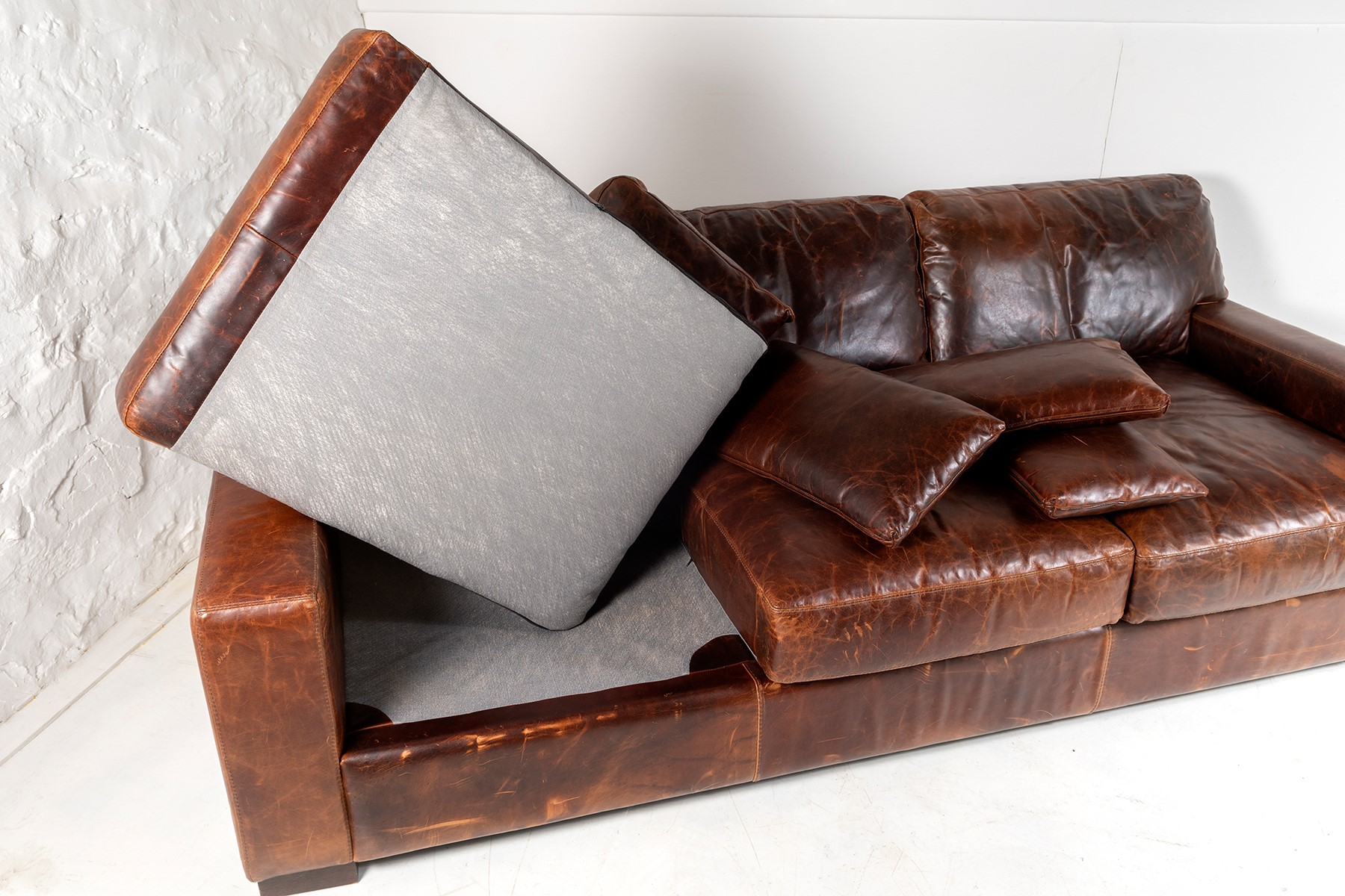 roche bobois leather sofa care